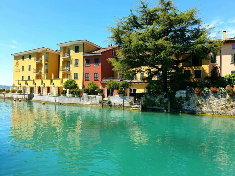 Colourful village by the water in Sirmione, Brescia, Italy