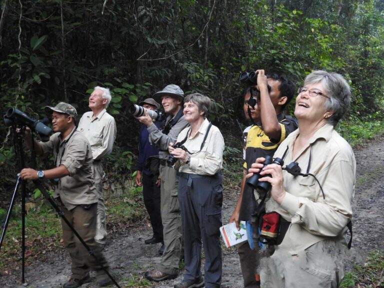 Our small tour group enjoying wildlife viewing in Sumatra.