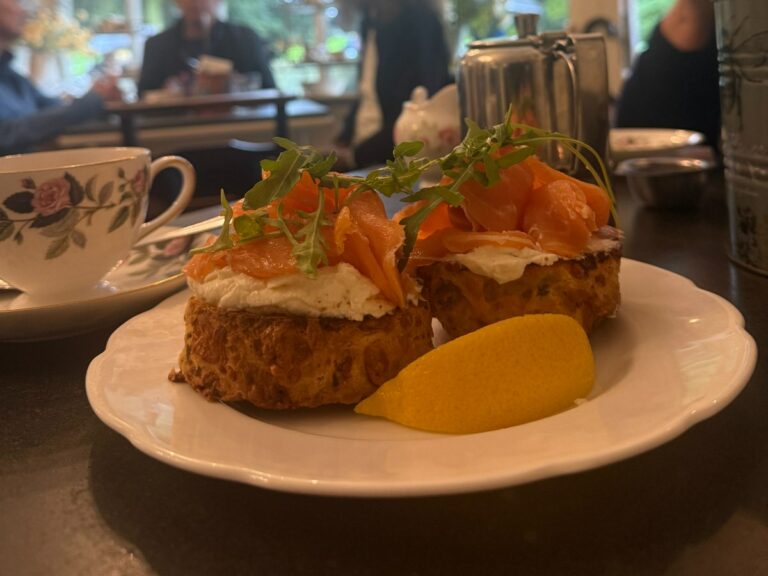 Smoked salmon canapés with lemon served at a group tour dining experience